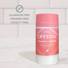 Crystal Coconut Vanilla aluminum free deodorant stick on a light tiled surface