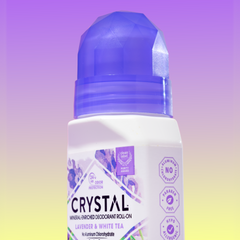 Close up of a Crystal mineral enriched deodorant roll-on bottle with a purple cap and lavender label