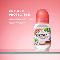 Crystal deodorant roll-on with coconut and vanilla scent on a pink background