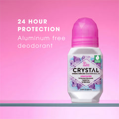 Crystal deodorant roll-on with pink cap on a pink background, highlighting 24-hour protection and aluminum-free feature.