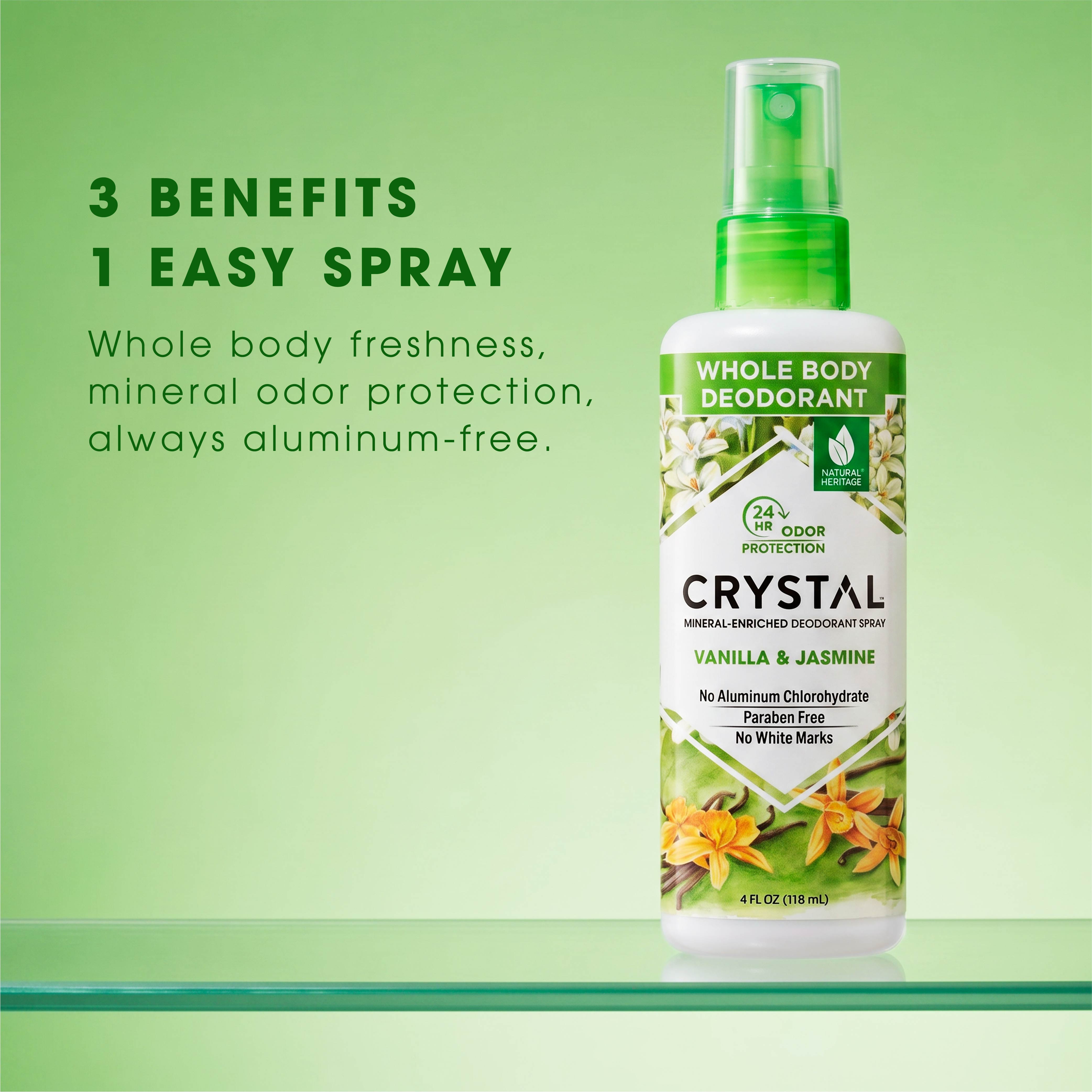 Crystal whole body deodorant spray bottle with green label on a green background