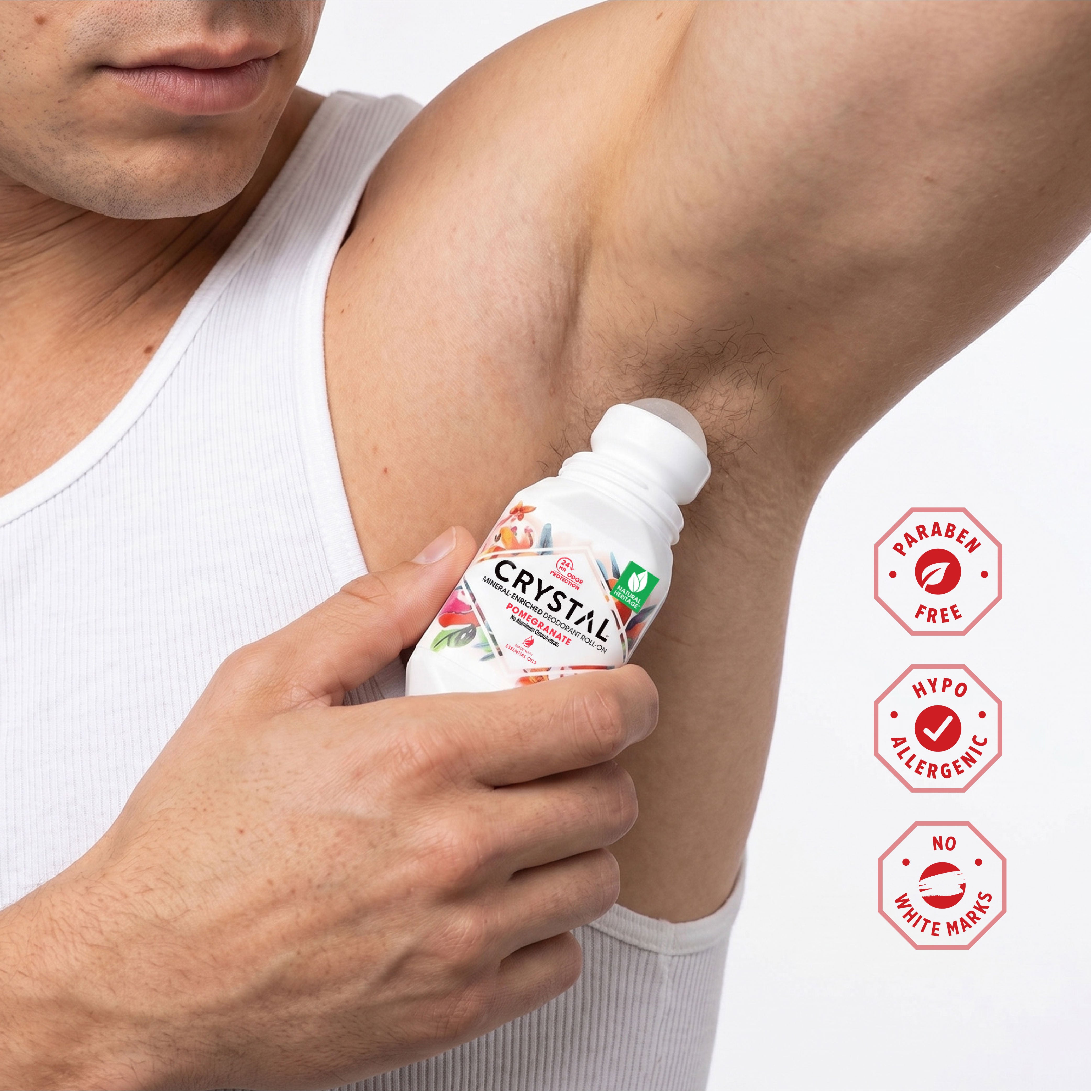Person applying Deodorant labeled 'Crystal' to their arm with product features displayed.