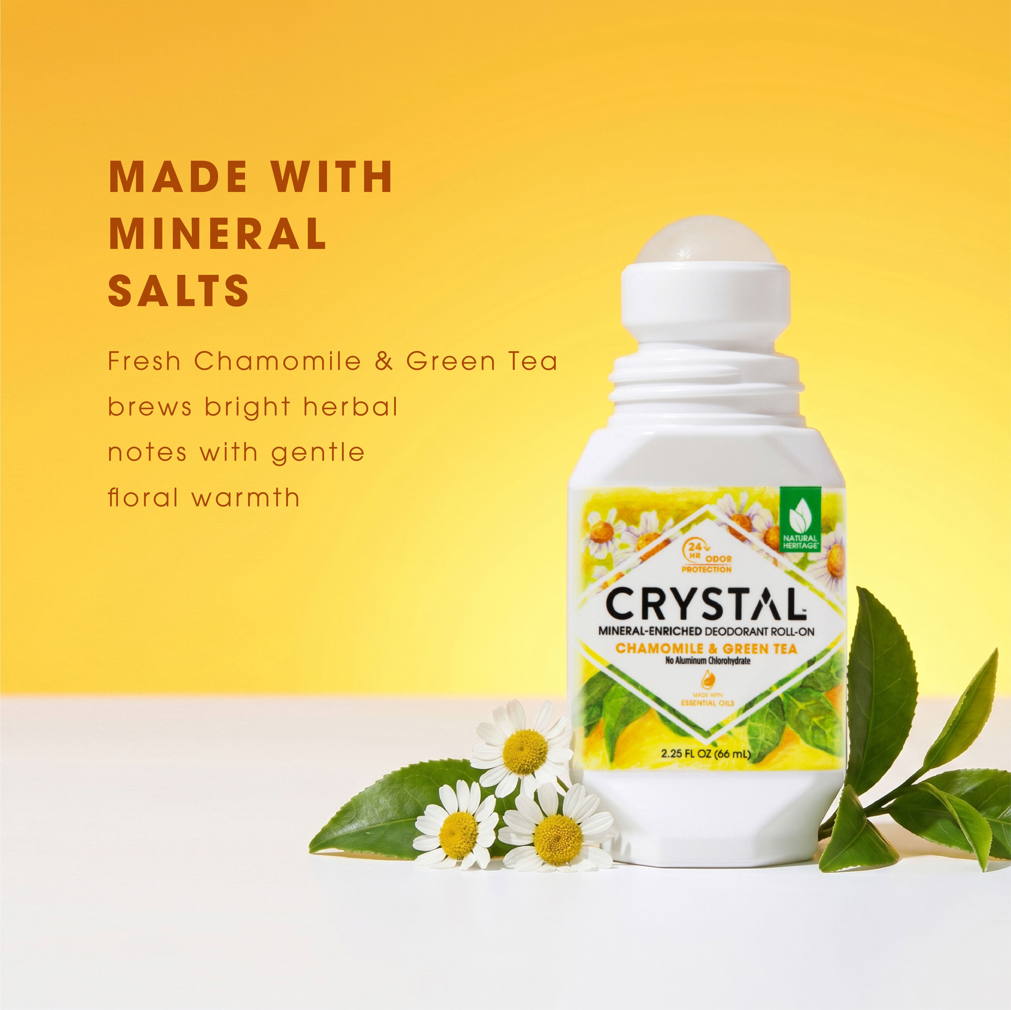 Crystal deodorant roll-on with chamomile and green tea on a yellow background