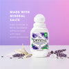 Crystal deodorant roll-on with lavender and white tea on a purple background