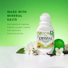 Crystal deodorant roll-on with vanilla and jasmine scents on a green background
