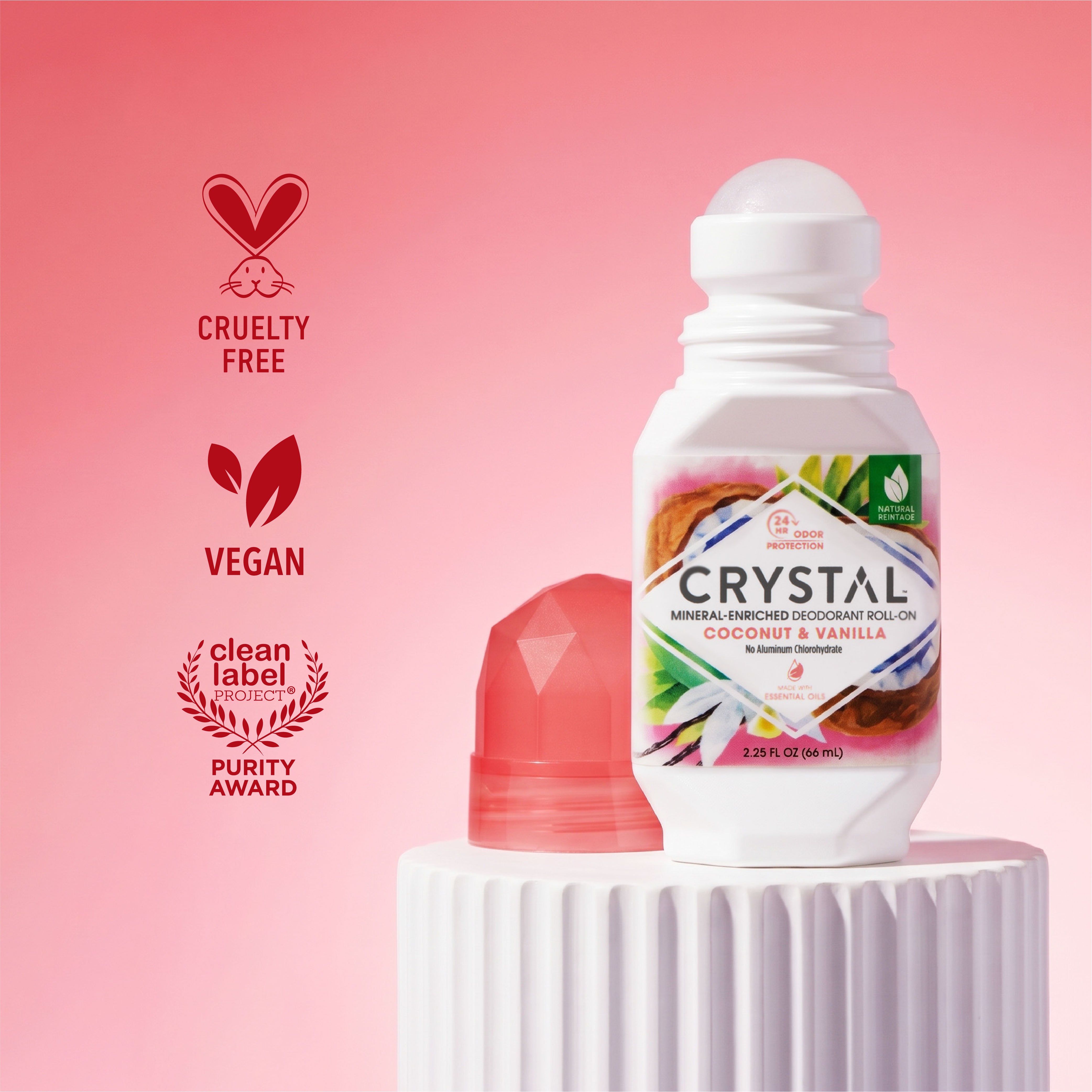 Crystal deodorant roll-on bottle with labels indicating cruelty-free, vegan, and clean label on a pink background.