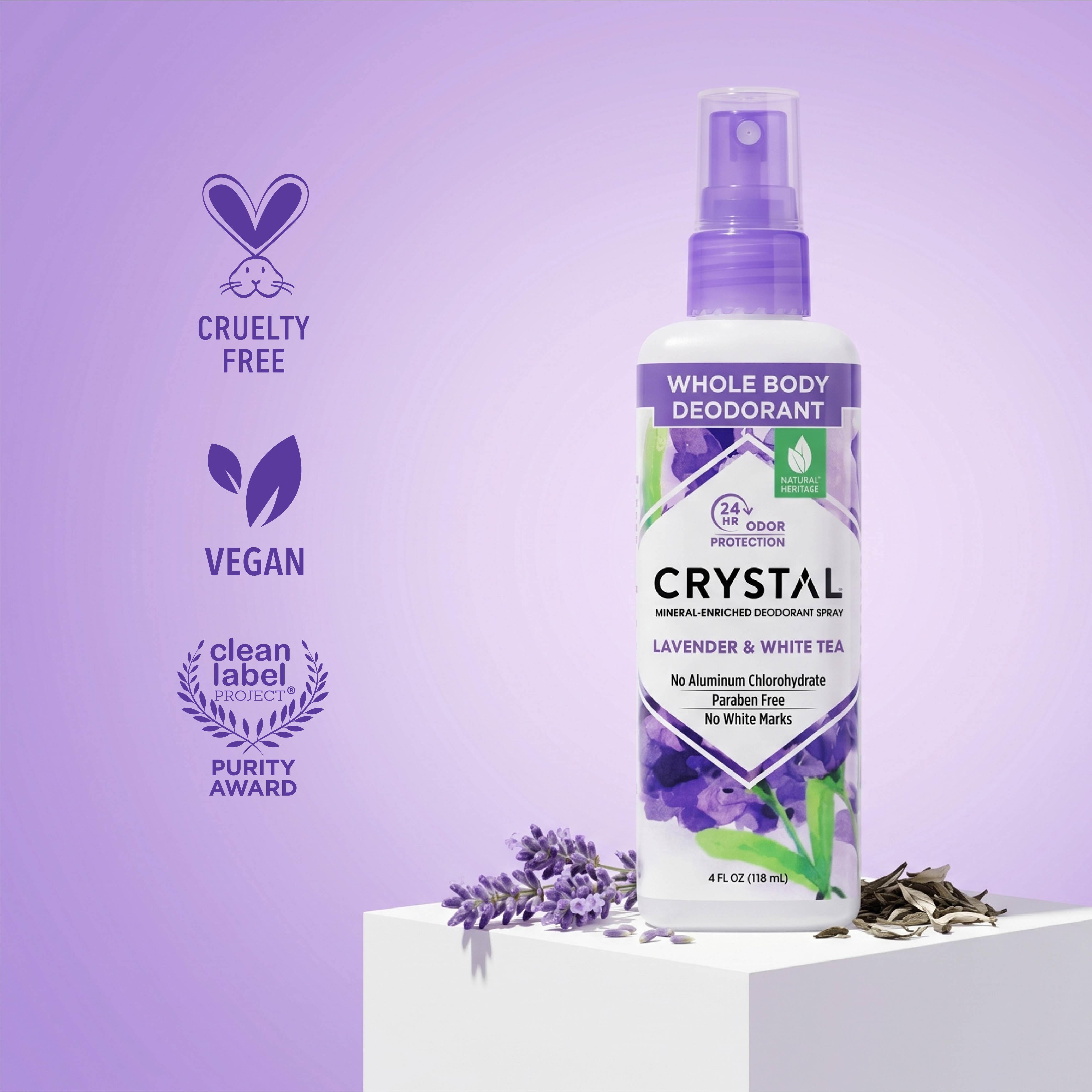 Crystal Whole Body Deodorant spray bottle on a purple background with brand icons.