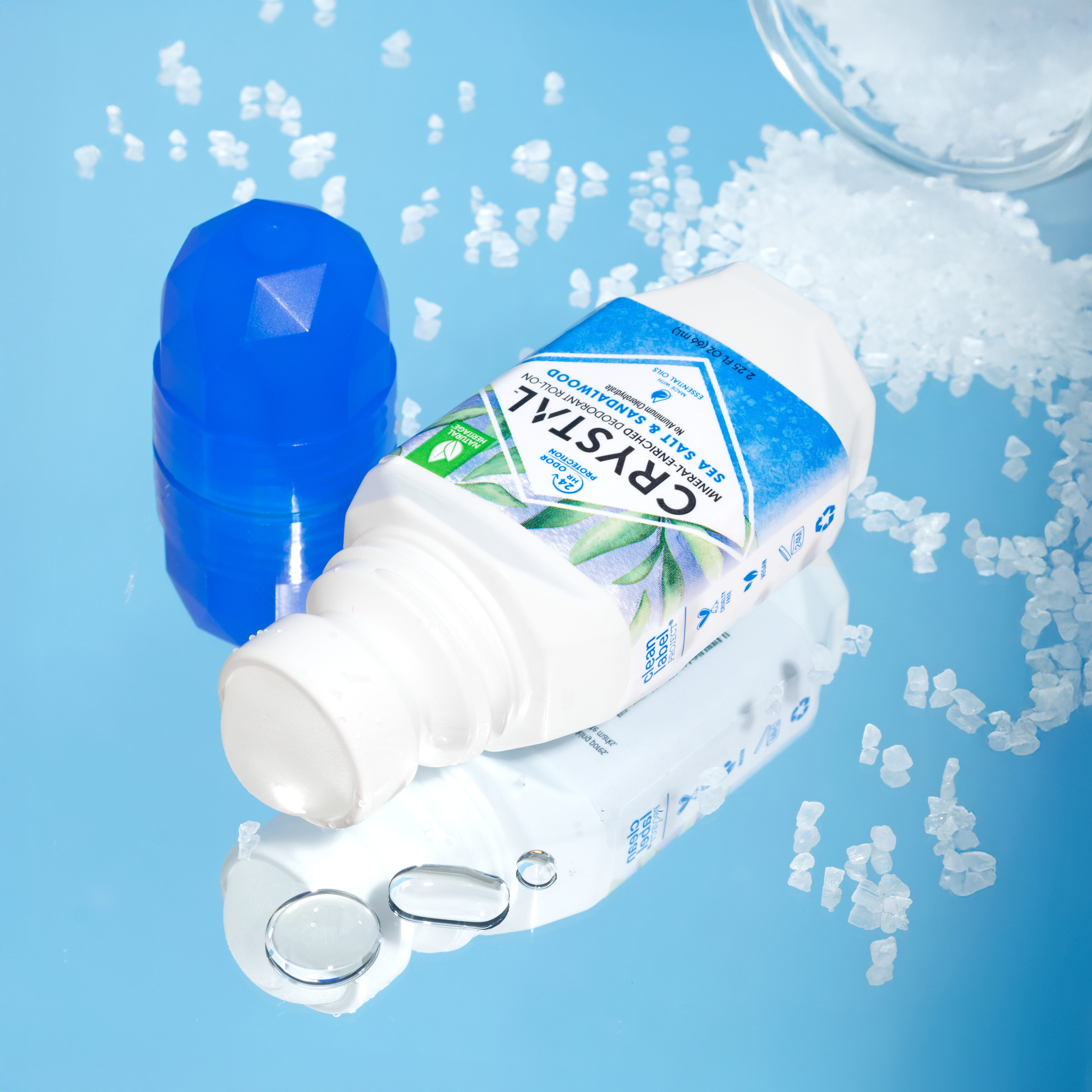 Crystral deodorant product with a blue cap on a light blue background